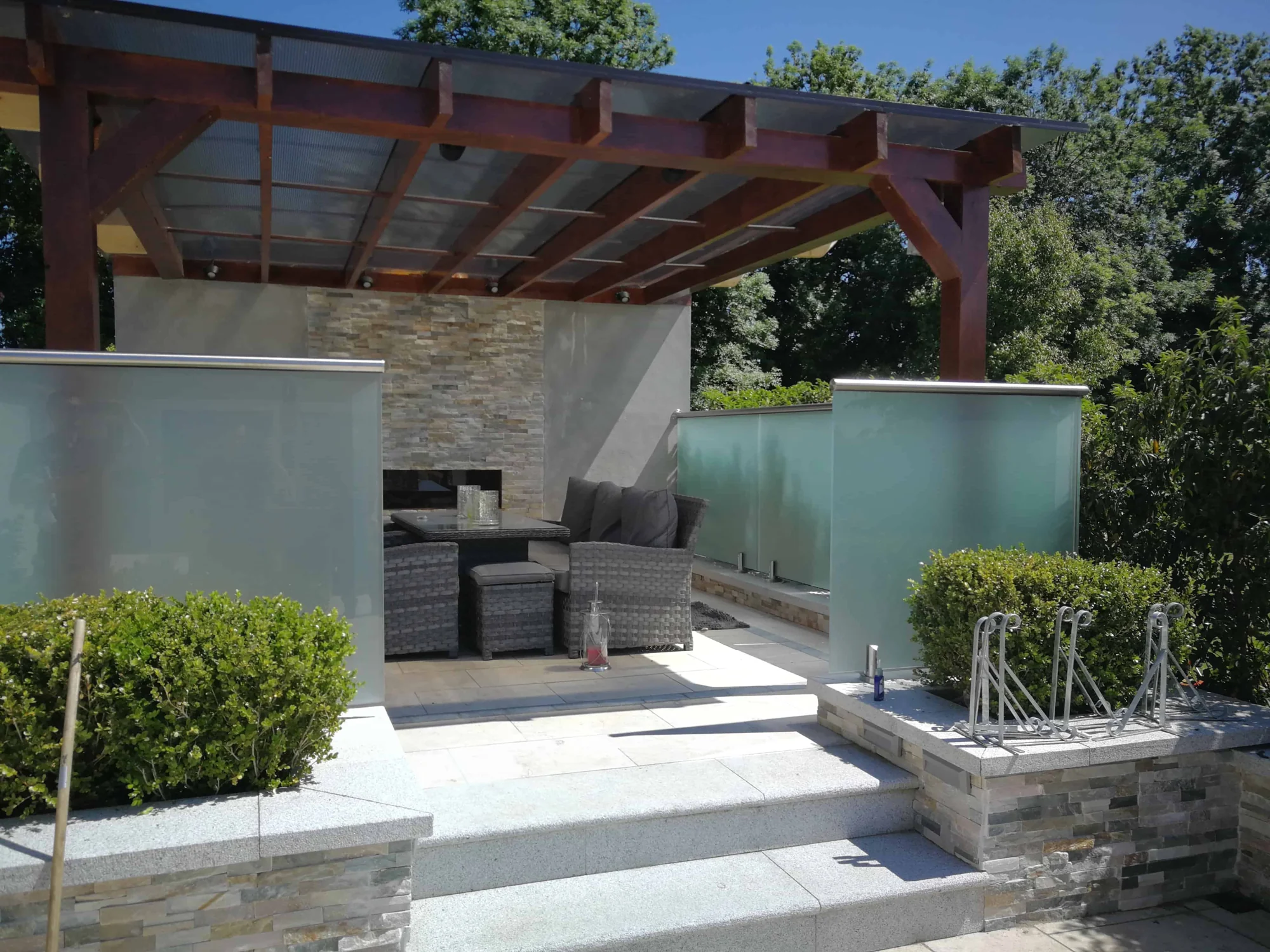 Glass privacy screens around an outdoor terrace in Garristown