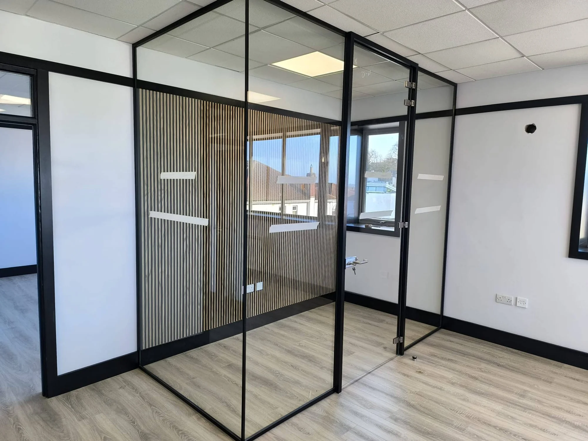 Black framed glass office partitions installed in Ranelagh