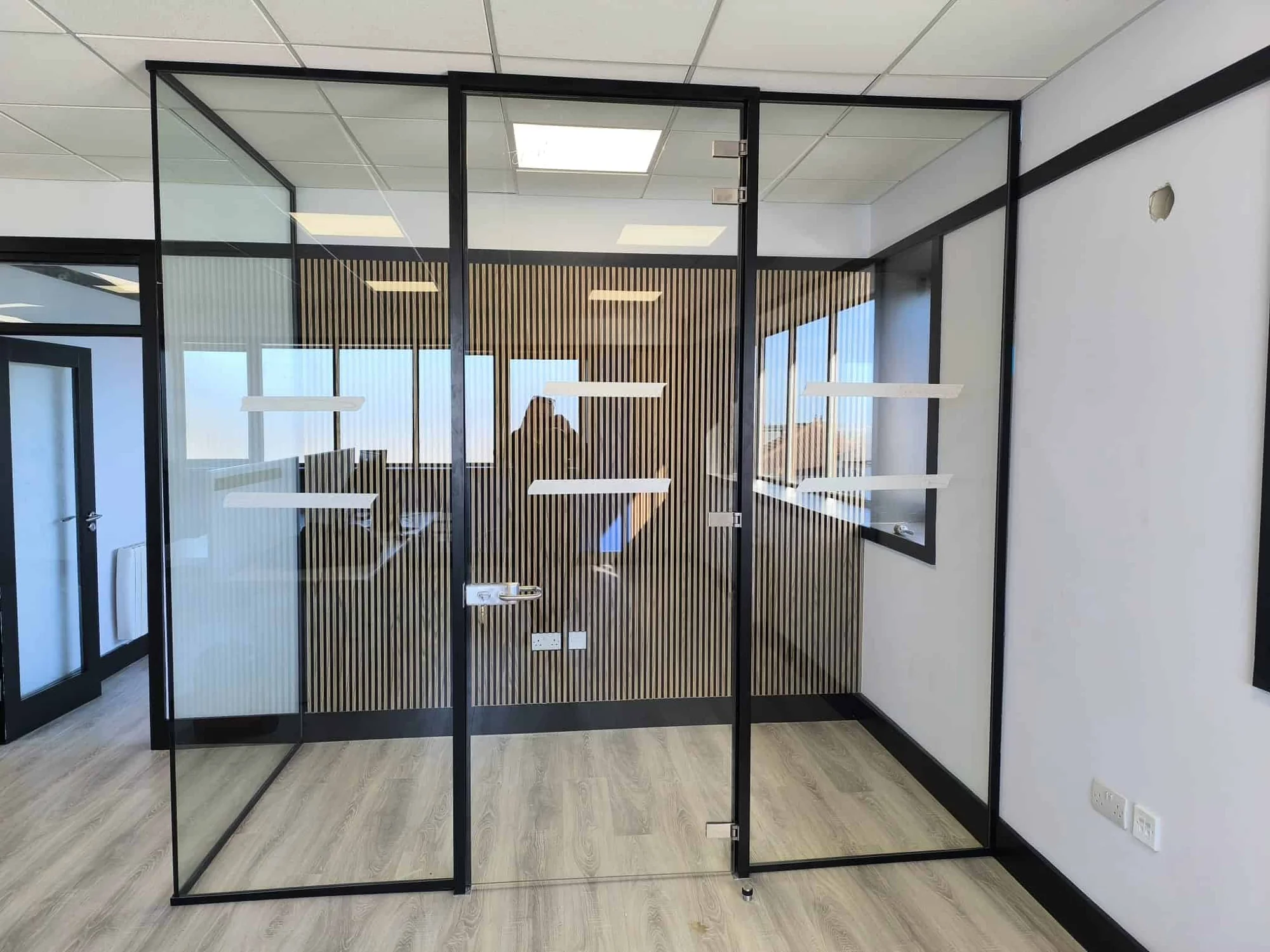 Black framed glass office door and partition in Ranelagh